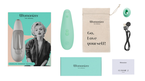 Вакуумний кліторальний стимулятор зеленого кольору Womanizer Marilyn Monroe - 9